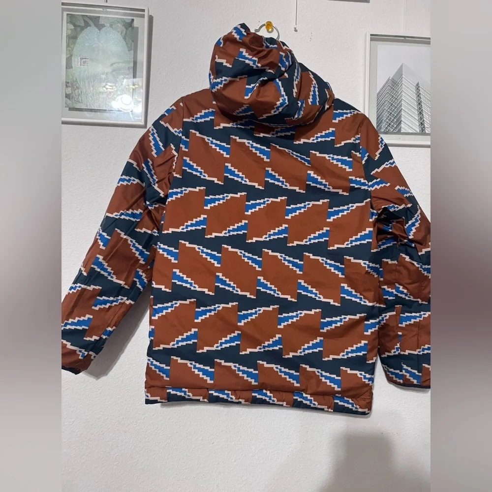 Patagonia Blue and Brown Puffer Jacket with Geometric Design